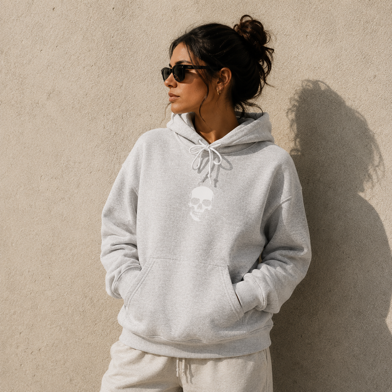 Minimal Skull Hoodie — Subtle White Skull Chest Design
